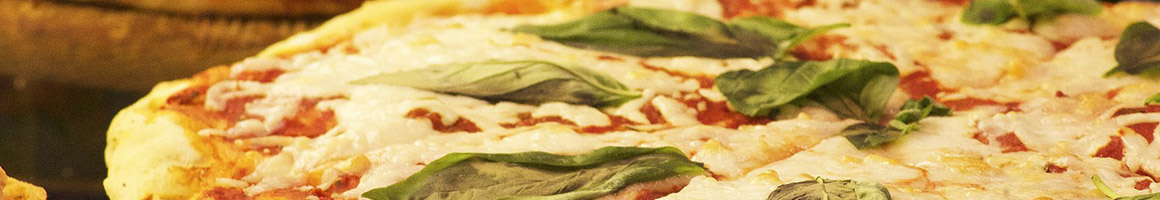 Eating Italian Pizza at Gina's Italian Kitchen & Pizzeria restaurant in Friendswood, TX.